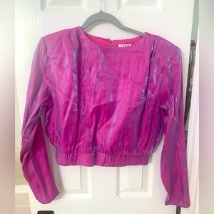 Cropped long sleeve with shoulder pads. So cute on! Size M